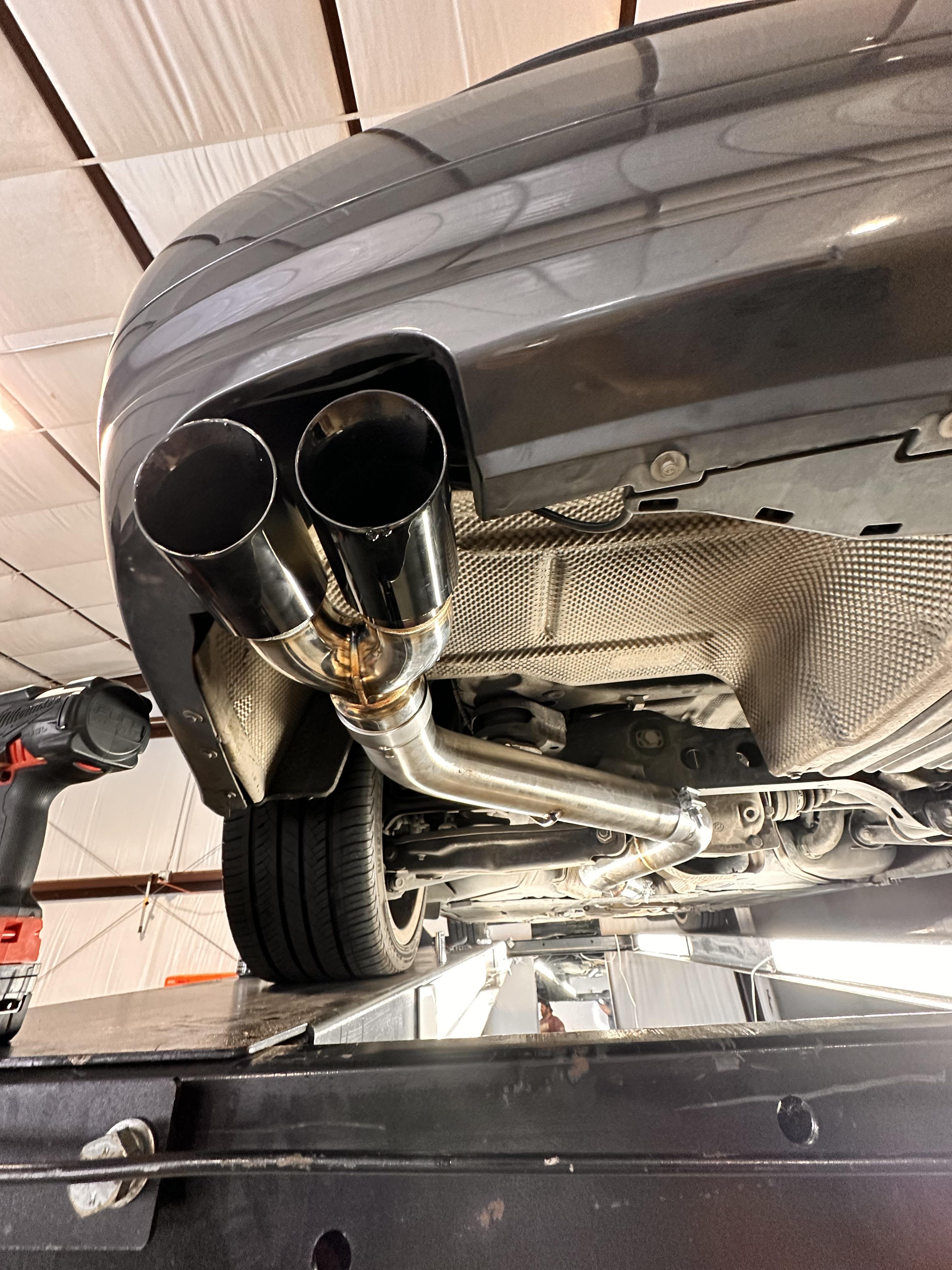 Exhaust modifications - professional muffler delete installation with polished stainless steel dual-tip exhaust